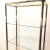 Stunning tubular chrome etagere shelf with shaped corner pieces in brass, styled after Milo Baughman. Very good-excellent...