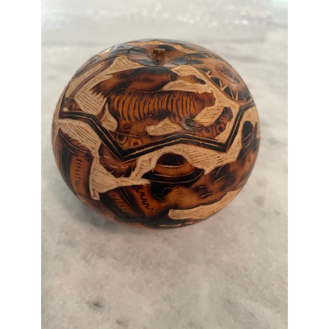 Traditional Mates Burilados Peruvian Carved Folk Art Gourd. Early 21st Century. One of the oldest art forms in South...