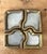 This rare and highly collectible four-piece puzzle ashtray set is a signature creation by the renowned Scottish-Spanish...