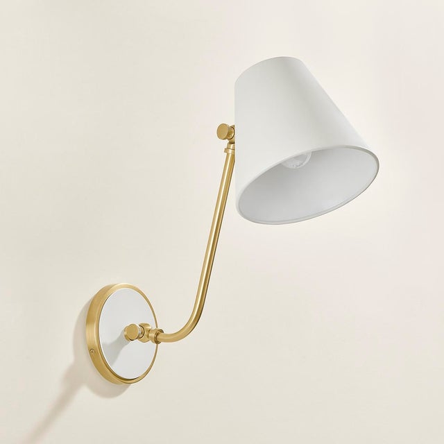 Leaning into traditional aesthetics, Georgann features clean lines and tapered shades with gently curved arms. Both its...