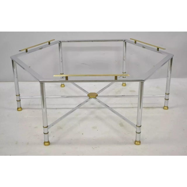 Italian Directoire Maison Jansen Style Polished Steel and Brass Hexagonal Coffee Table. Item features solid brass accents,...