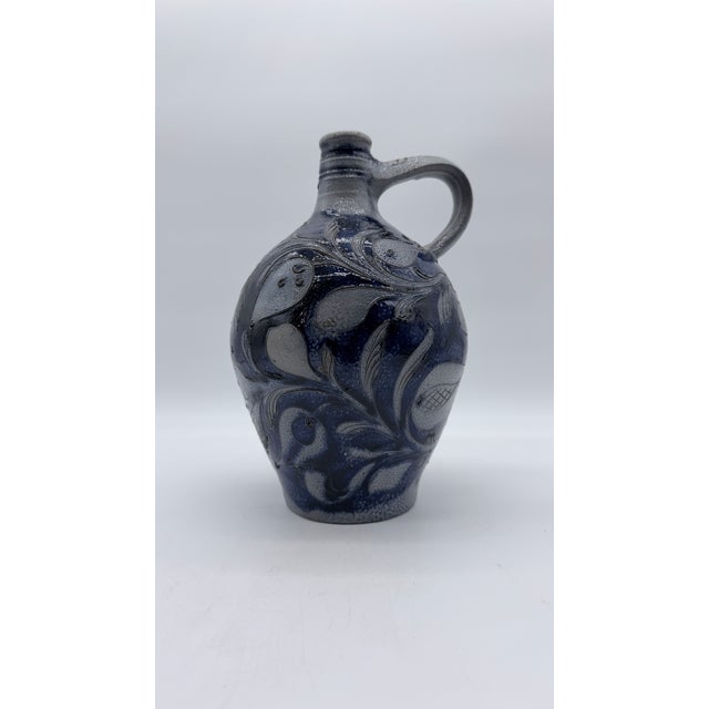Antique German Westerwald Blue Incised Stoneware Jug, Circa 19th Century A magnificent and richly decorated example of...
