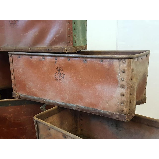 Fair condition. Numerous signs of wear and tear, needs cleaning. 10 crates measuring 59.5 cm long x 25.5 cm wide x 22.5 cm...