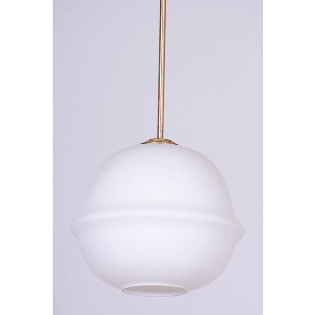 Maker: Kamenický Šenov This pendant chandelier, originating from the 1960s, represents a magnificent example of...
