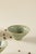 A set of two Japanese-style ceramic bowls; the glaze features a vein-like pattern, with a soft and understated color palette.