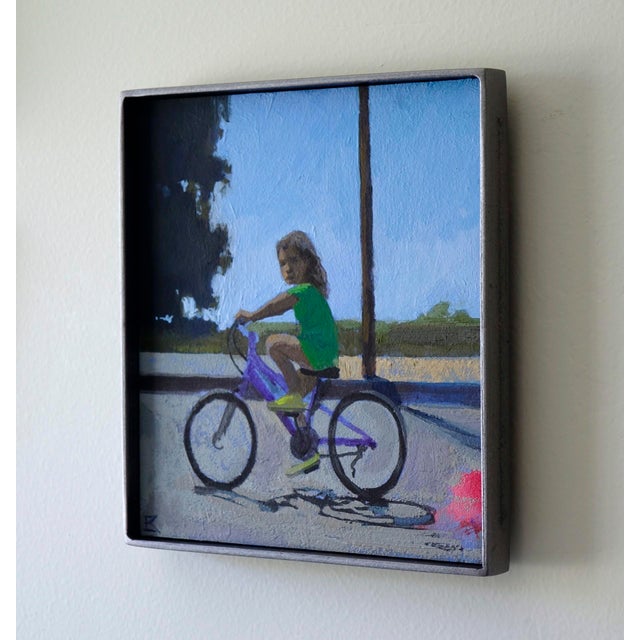 Figurative Traces by Emma Kalff | Oil on panel Girl riding a purple bicycle on a sunny street. For Sale - Image 3 of 5