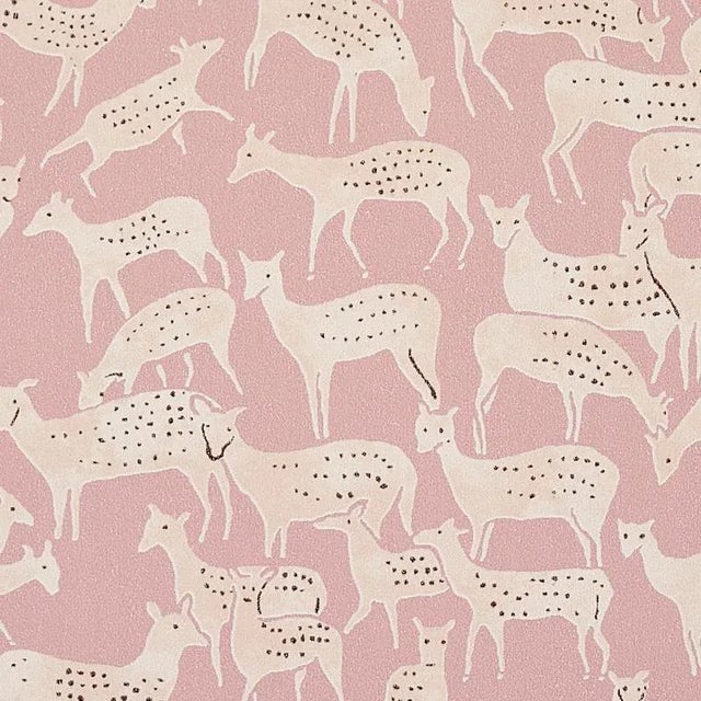 Miniature herds of hand-drawn deer, each with a distinct expression, give this small-scale wallpaper design unique,...
