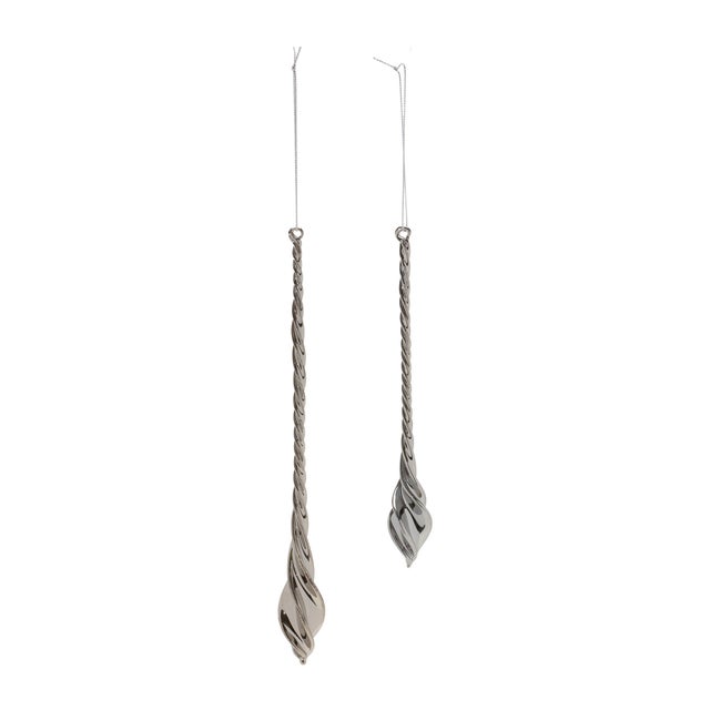Elevate your holiday decor with the exquisite Swirl Glass Drop Ornaments. Featuring sleek black tones and a delicate swirl...