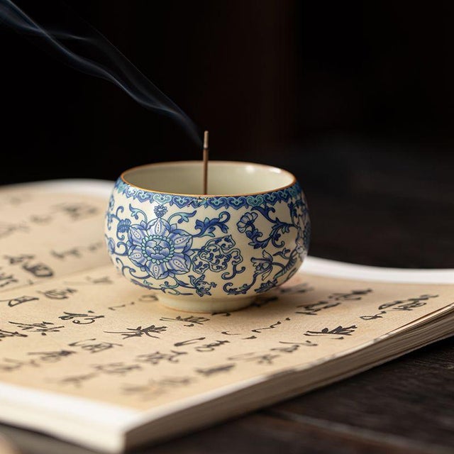 This is a vintage ceramic incense holder in the style of traditional Ru ware. The piece features a classic rounded form...
