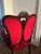 Elegant Victorian red upholstered accent chair with carved wooden frame. Appears to have been made by Edgar Bros. in...