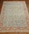 A room size Persian wool and silk highlight Persian Qum rug from the early 20th century. Powder blue field and red border