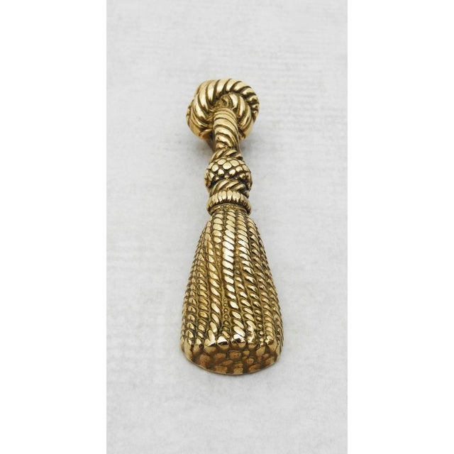 Mid-Century Modern Brass Pom-pom Bottle Opener in the style of Hermès, France, 1960s For Sale - Image 3 of 9