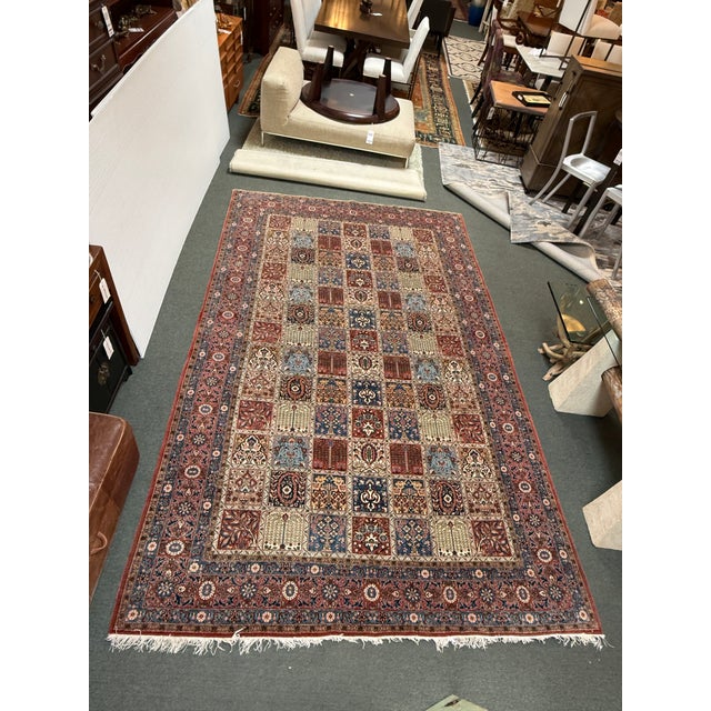 Design Plus Gallery presents a 1960's 7ft 1in × 11ft 7in Hand Woven Bakhtiari Area Rug from Iran. The rug has individual...