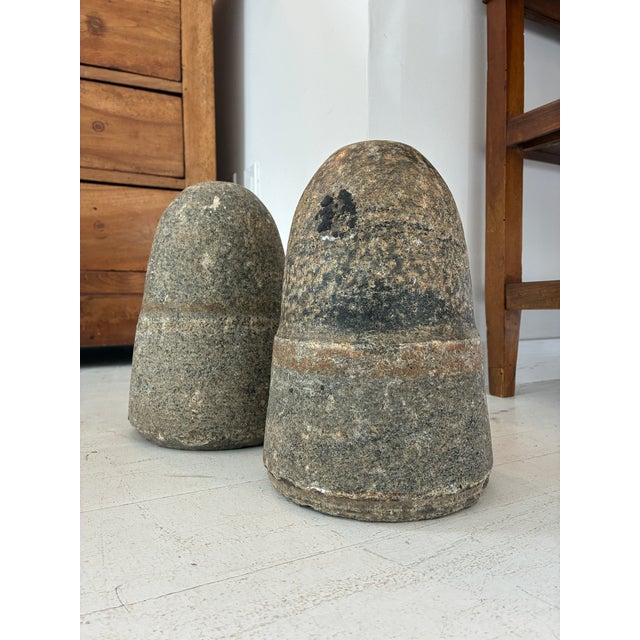 Vintage boat ties from the docks in Venice Italy. These concrete and granite pieces would make the perfect door stoppers.