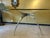 Table from the Errance series designed by Bernard Dequet. The central base, crafted and polished from aluminum with four...