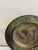 A charming vintage find for the collector of global decor — this small brass dish features an intricately hand-etched...