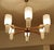 Large vintage danish modern style pendant light by Temde featuring 6 teak spokes with brass trim, center teak support,...