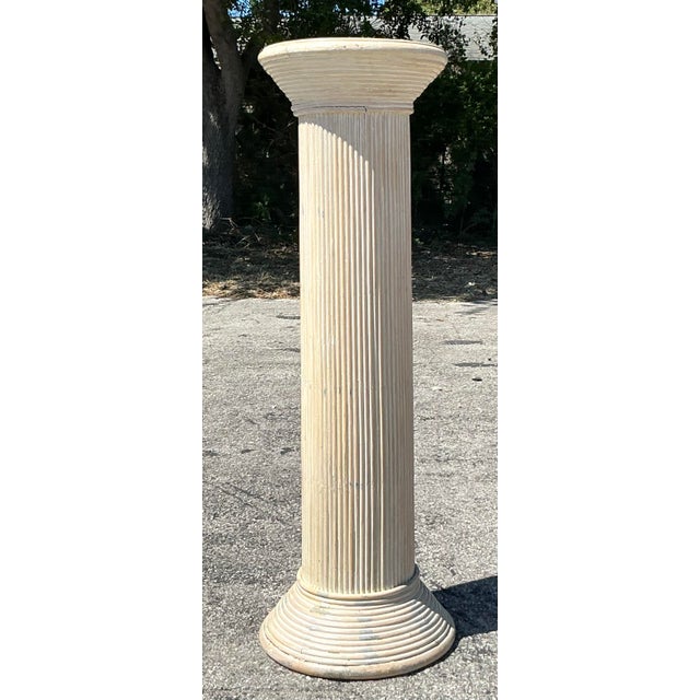Add a touch of coastal elegance to your home with this stunning vintage pencil reed column pedestal. Featuring a classic...