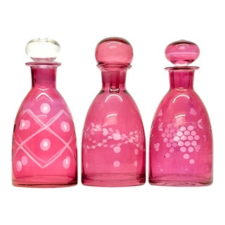 Vintage Cranberry Glass Decanters With Stoppers Curation - Set of 3 For Sale