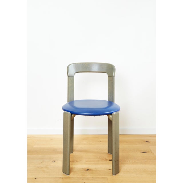 Condition: Very good condition. Frame painted in mud green. Seat upholstered in blue faux leather. Extremely rare in this...