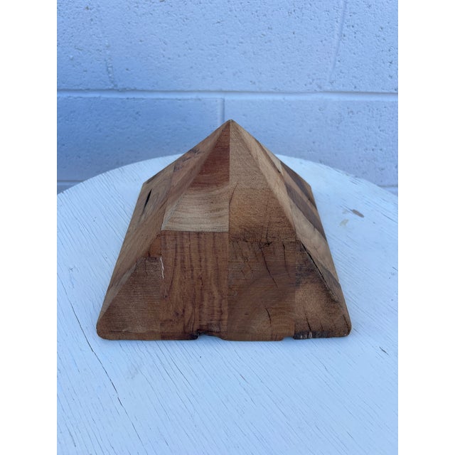 Striking sculptural object handcrafted from solid wood, constructed from individually glued-up blocks in a geometric...