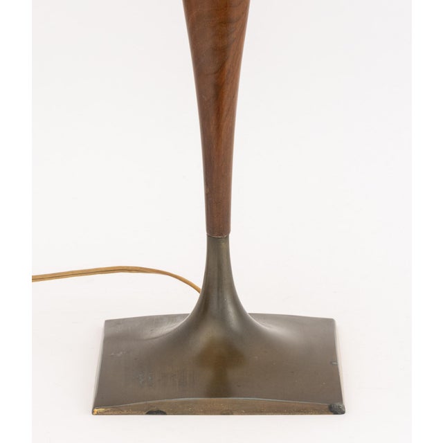 Gerald Thurston "Wishbone" Walnut and Bronzed Metal Table Lamp, with beige octagonal pleated shade. With shade: 29" H x...