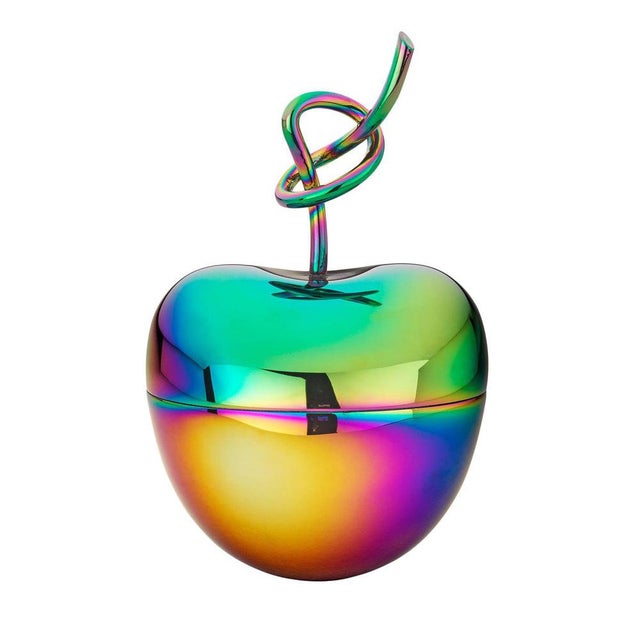 The Knotted Cherry decorative box features a distinctive knotted stem design atop a smooth, rounded container inspired by...