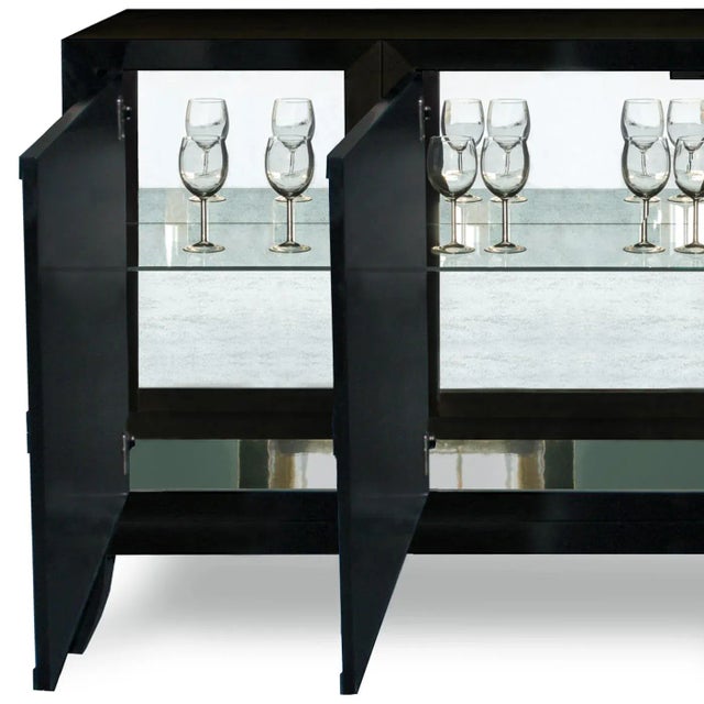 This four-door sideboard (180 - 210cm wide) is beautifully crafted by the finest Italian artisans and is finished in a...