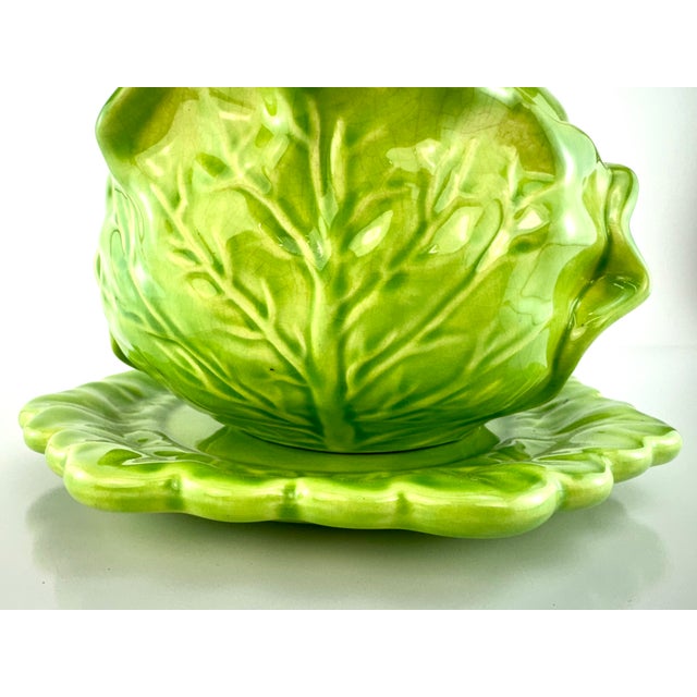 This whimsical Holland Mold cabbage tureen with matching underplate is a cheerful, hand-glazed ceramic serving piece,...