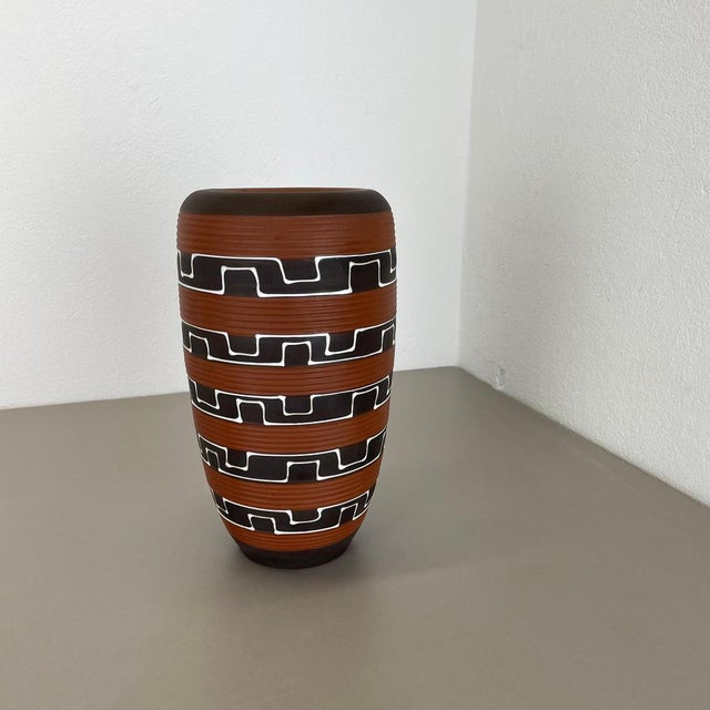 Article: Pottery ceramic vase Producer: ILKRA Ceramics, Germany Decade: 1950s Original vintage 1950s pottery ceramic vase...