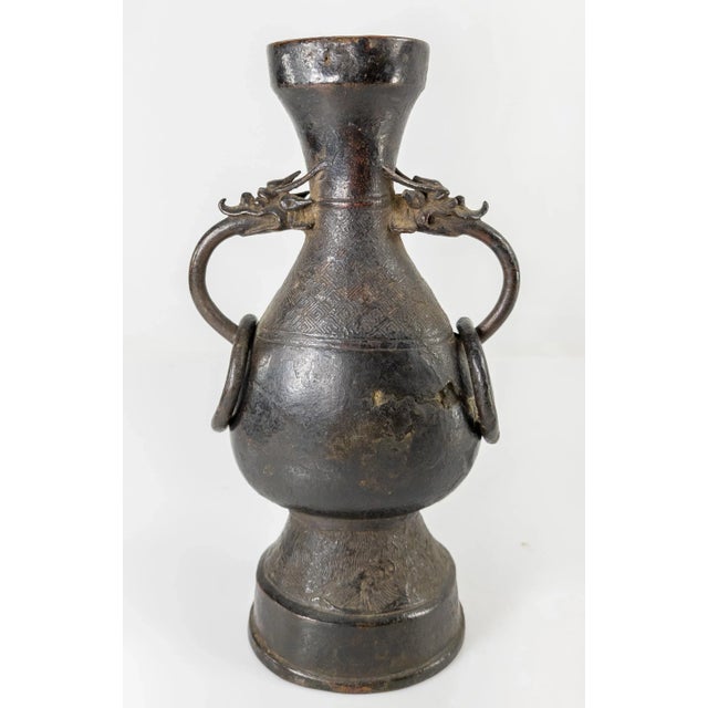 We are selling this great early Chinese Bronze vessel. This bronze vase features typical Chinese body shape with stylistic...