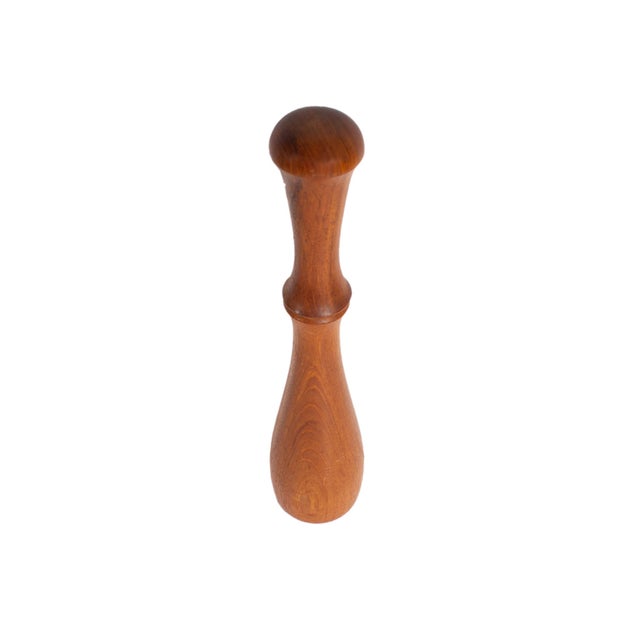 A 1970s or 80s pepper mill designed by the Danish designer Jens Quistgaard (1919-2008) for Dansk. Made of teak, this...