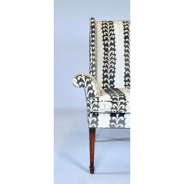 A superb Mid-Century Italian Modern wing back accent armchair with the loveliest flared rolled arms, plush goose down...
