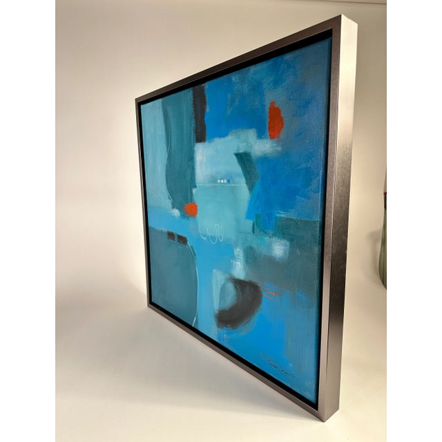 Abtsract modern painting by Eugene Smith. Saturation in color or blues and red/orange with black swaths creates this...