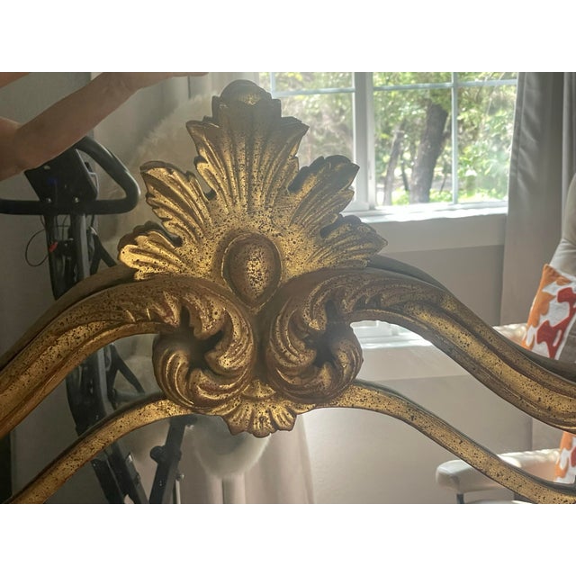 Rococo style scrollwork. Tilted double frame.