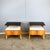 A beautiful pair of bedside tables from the german workshop for interior design, whose distinctive style evokes the 1950s....