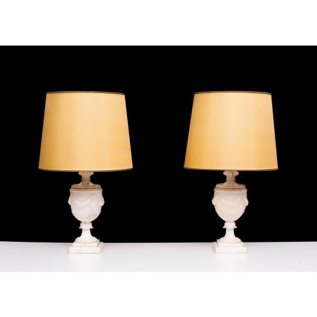Stunning set of Classical Greek Alabaster Table lamps . 1950s Italy comes with beautiful Gold color shades . Perfect match...