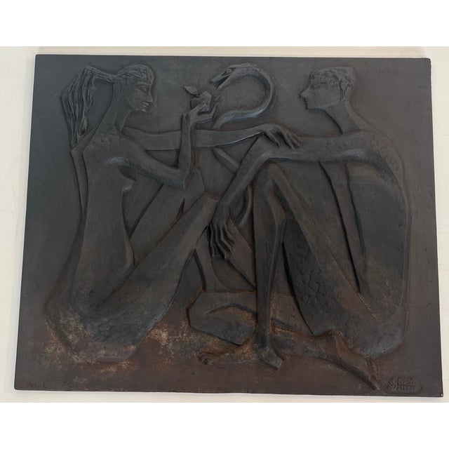 This beautiful and rare modernist fireback is made of cast iron. It depicts Adam and Eve, the apple, and the serpent. It...
