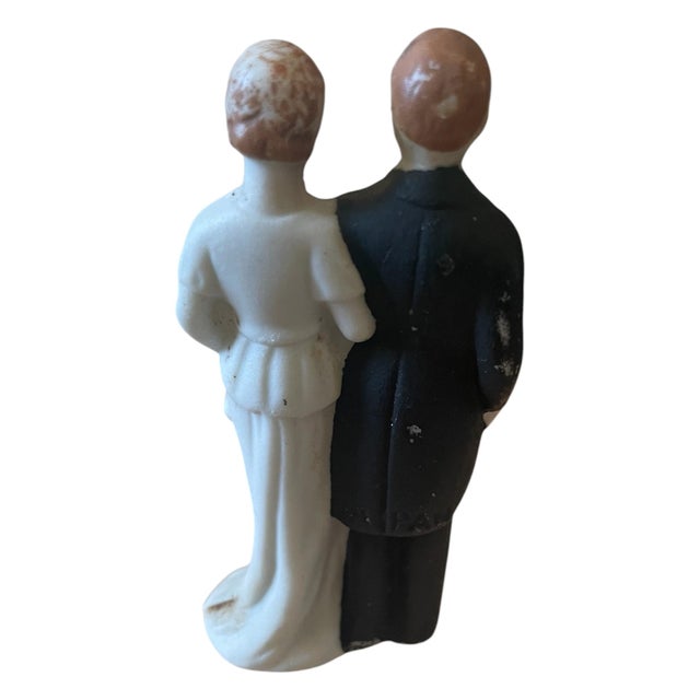 Bisque porcelain wedding cake topper of a bride and groom from the 1940s, made in occupied Japan. Perfect for a modern day...