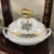 The Herend Queen Victoria Pattern Small Turin Butterfly Top Sugar Bowl Trinket Box is a beautiful and intricate piece made...