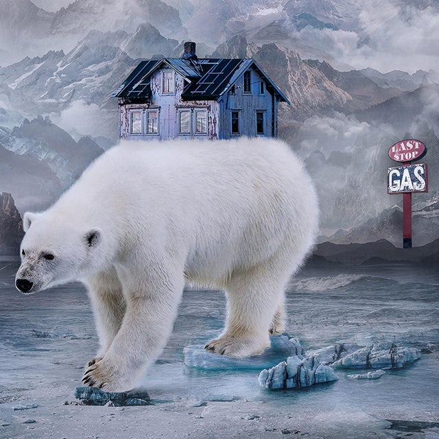 This photograph presents a surreal landscape where polar bears traverse a desolate, icy expanse, juxtaposed with...