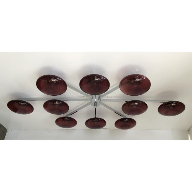 Italian midcentury flush mount with ten amethyst Murano glass shades carefully hand blown with bubbles inside the glass...