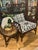 This is a very large chair with chinoiserie flair. The wrapped rattan is constructed in an hour glass design and the...