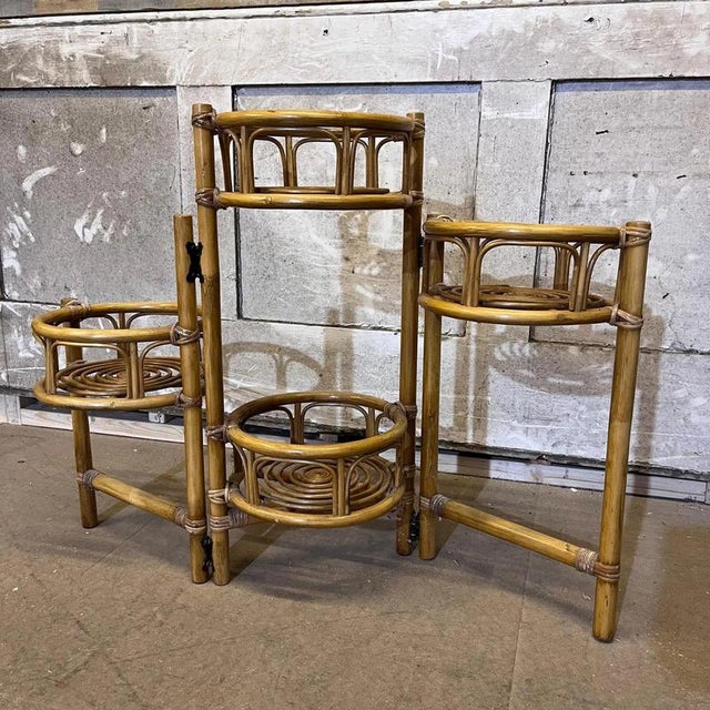 70s French Riviera style folding planter, wood bamboo and rattan There are 4 spaces for plants and has hinges to alter...