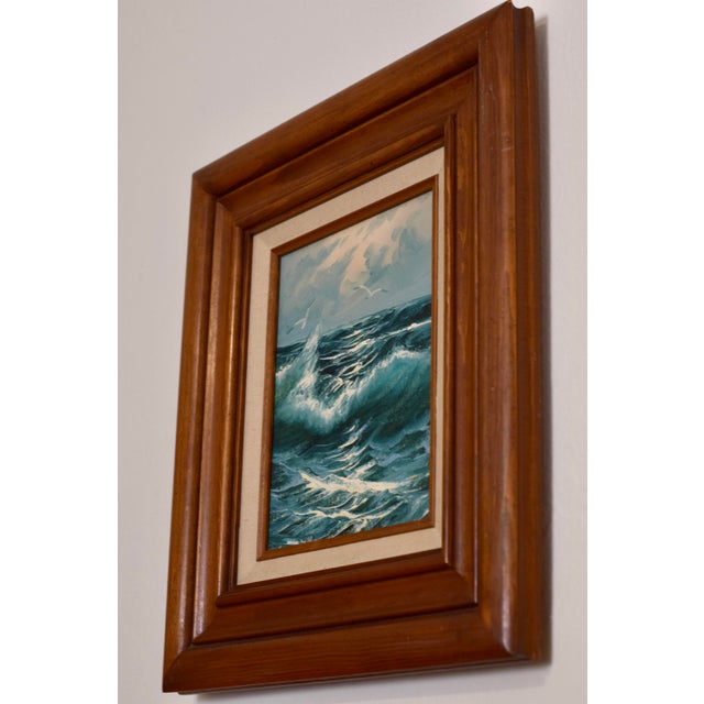 Original oil on canvas, stormy sea with breaking wave and two seagulls. Thick, textured brushwork in blues, teals and...