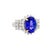 A striking fashion ring featuring a central 3.90 carat oval tanzanite with a vivid blue hue. Encircling the centerpiece...