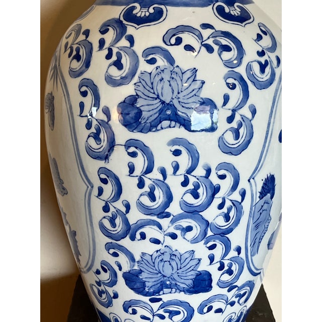 Elevate your space with this impressive 19-inch Chinese blue and white porcelain baluster vase. This substantial statement...