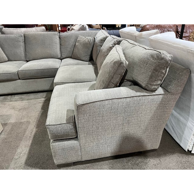 Effortlessly sophisticated and designed for everyday comfort, this Arhaus “Dune” sectional sofa embodies relaxed modern...