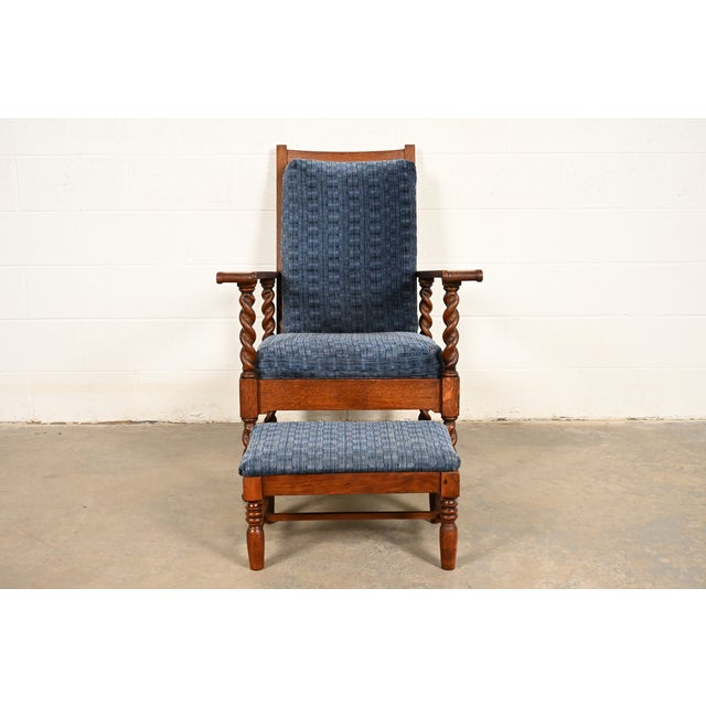A beautiful antique Arts & Crafts or English Jacobean style barley twist lounge chair with ottoman By Stickley Brothers...