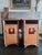 Two mission nightstands in the style of Stickley. Crafted from oak. Square top over an open shelf and cabinet door. One is...